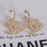 Chanel Comete Logo Earrings with Crystal and Pearl in Metal Gold