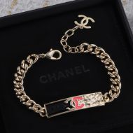 Chanel Logo Plaque Bracelet in Brass Gold/Black