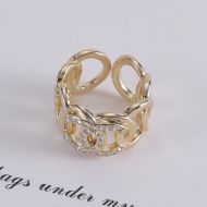 Chanel Open Chain Ring with Crystal Logo in Brass Gold