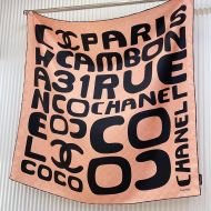 Chanel Scarf 90 with Coco Chanel and 31 Rue Cambon Paris Print in Silk Orange