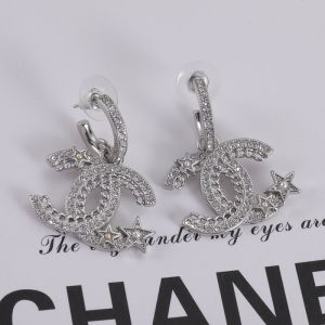 Chanel Comete Logo Earrings with Crystal and Pearl in Metal Silver