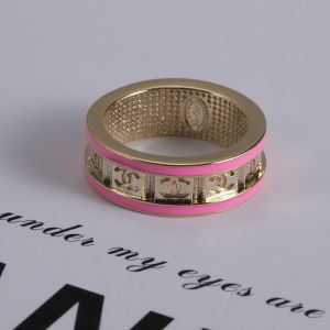 Chanel Engraved Jacquard Logo Ring in Brass and Enamel Gold/Pink