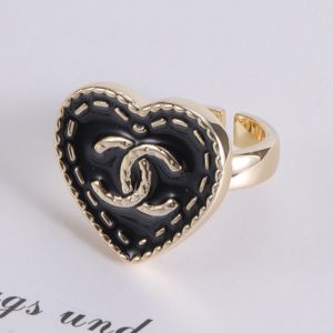 Chanel Open Chain Heart Logo Ring in Brass Black/Gold