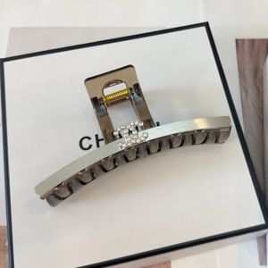 Chanel Shark Hair Clip with Crystal Logo in PVC and Steel Coffee